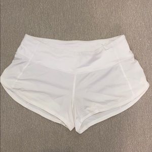 White Lululemon athletic shorts